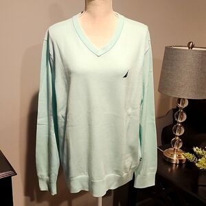 Nautical Navtech v-neck pale blue with navy blue symbol sweater size large